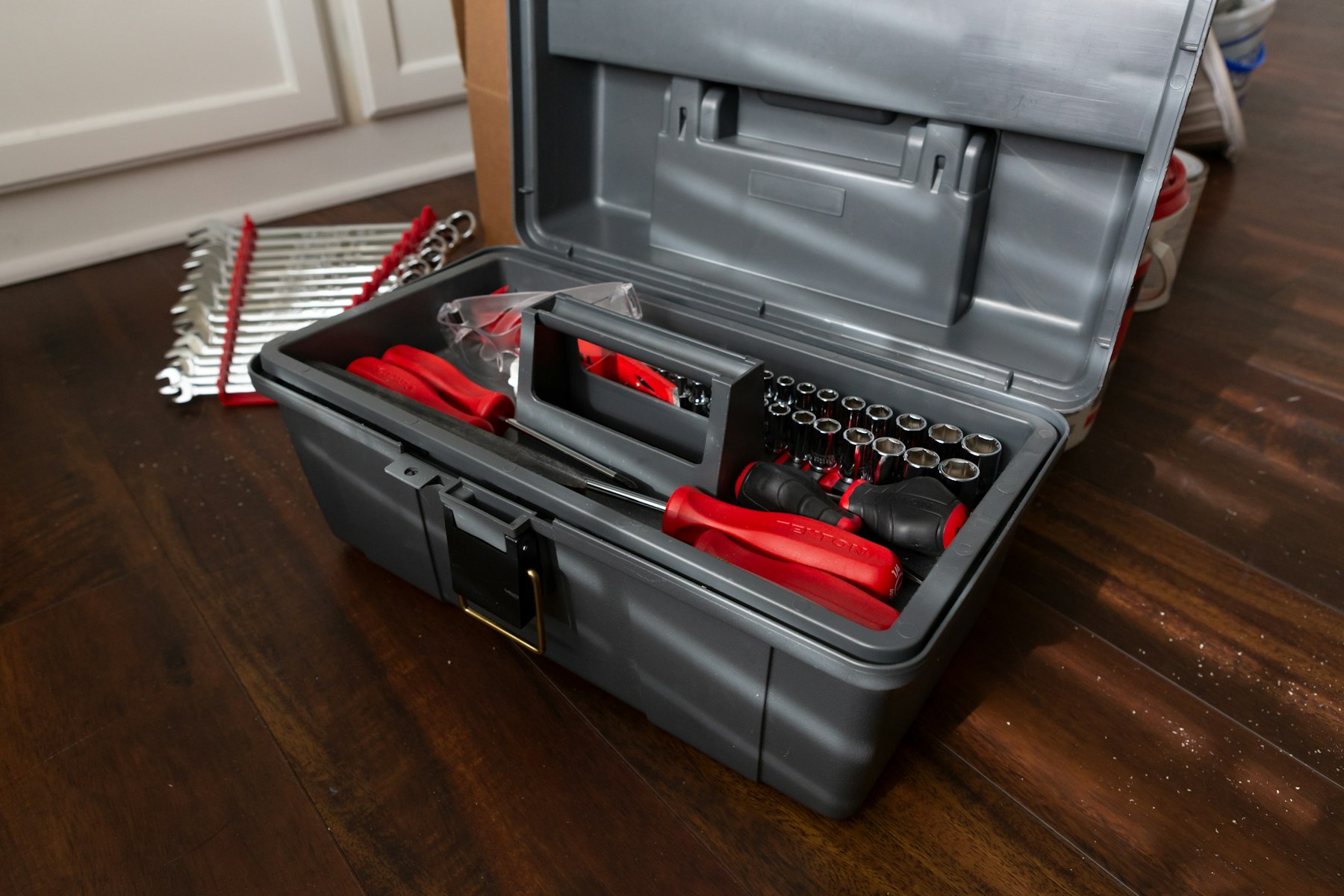 Toolbox and small repair materials on a work surface